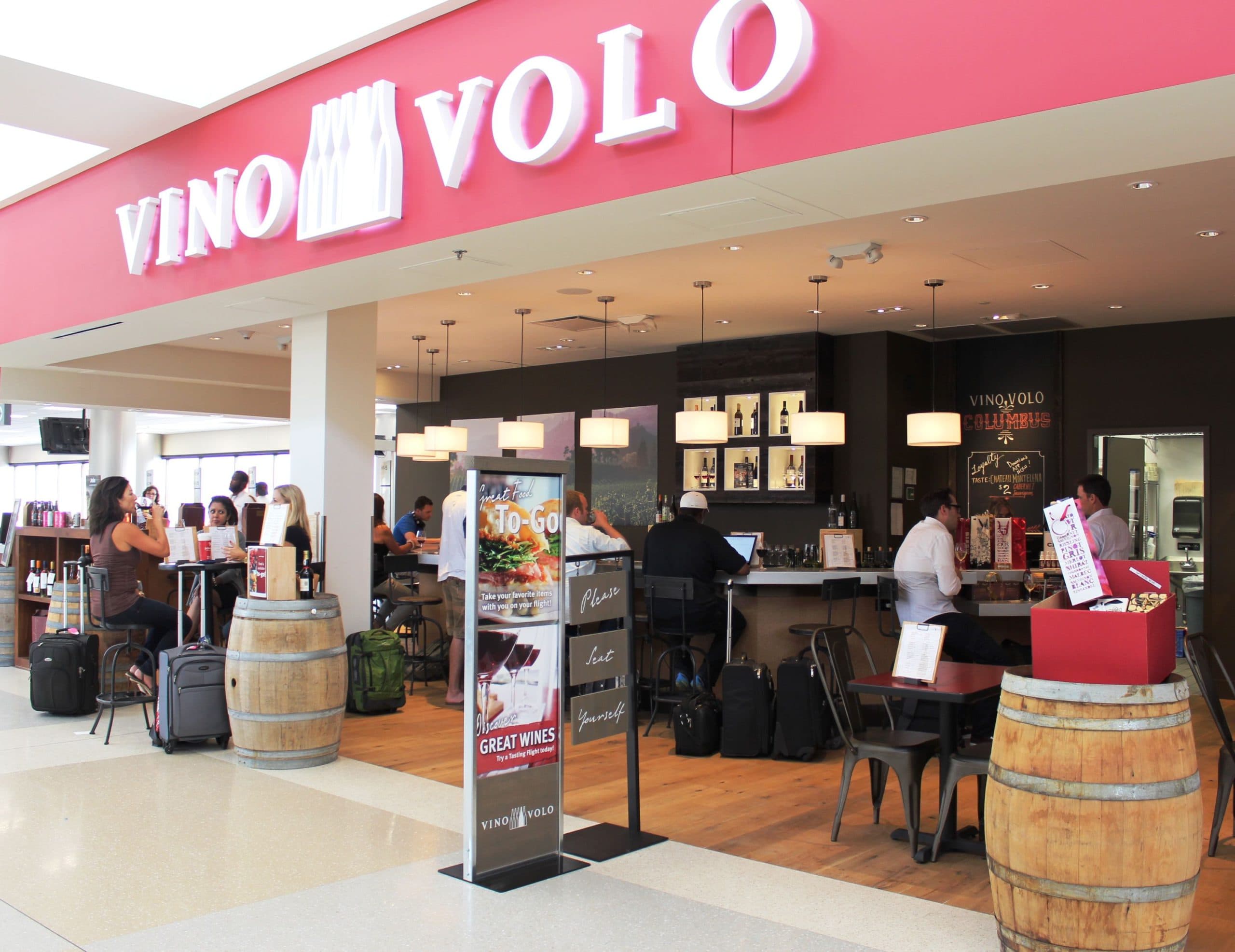 Airport wine bars – Catch your flight while catching a flight of wine.